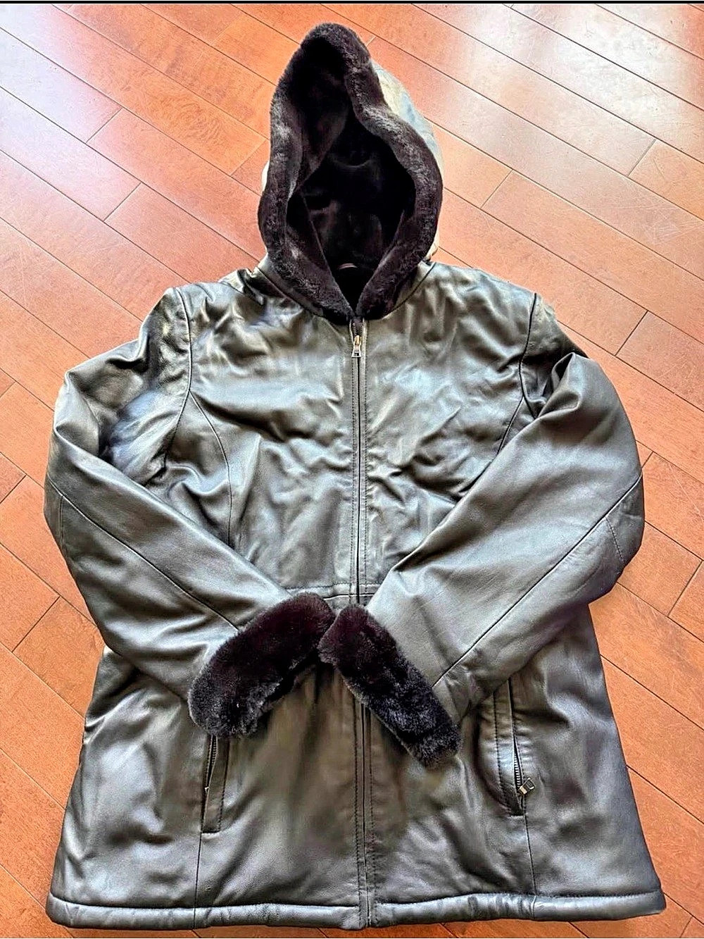 Women’s winter Hooded Leather Jacket Black with fluff inside.